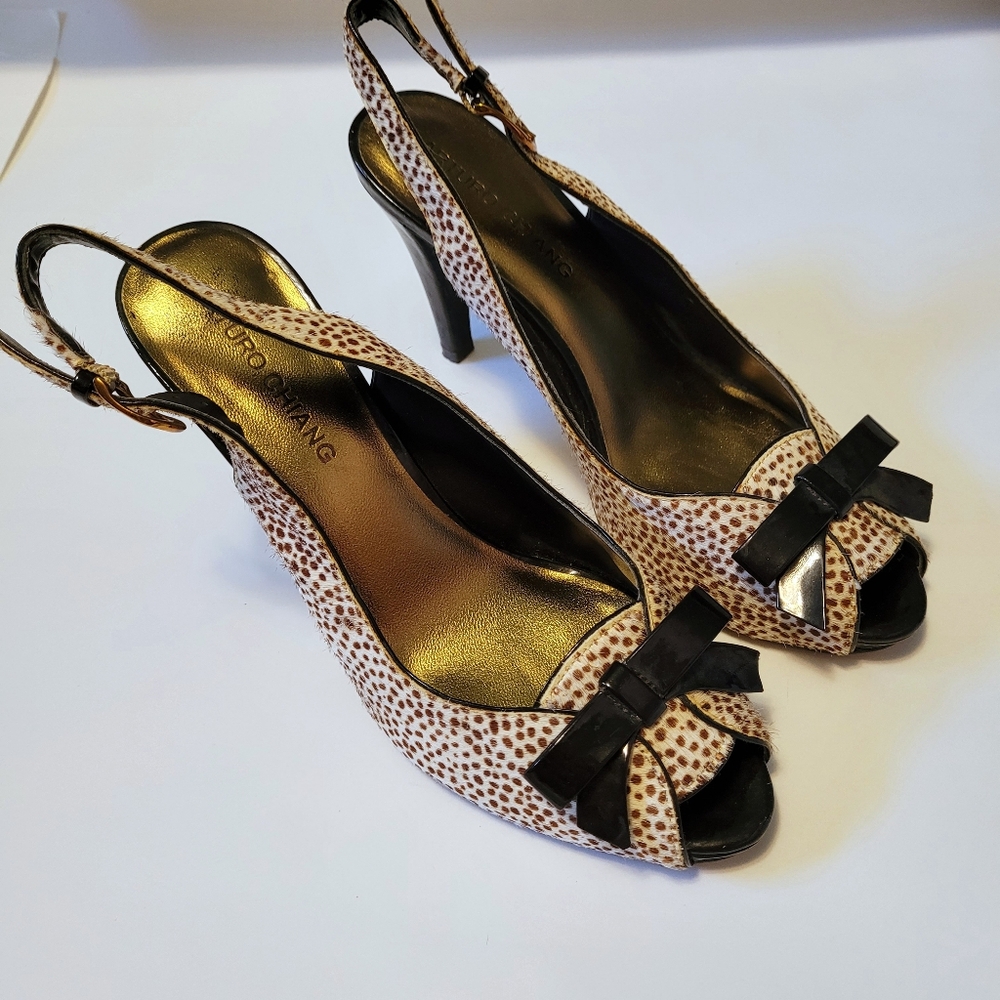 Calf hair heels with black bow